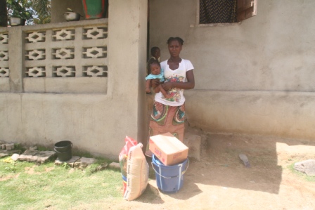 A widow of a health worker who died from ebola in Bombia 1 community receive donation