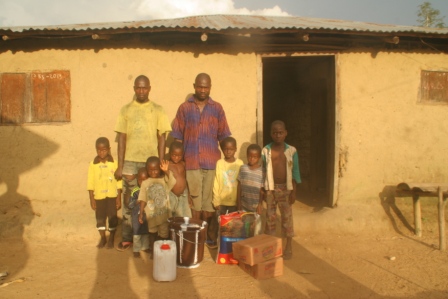 Amara Kannah (4th from right to left), a 30 year old man in Wormanon lost wife to ebola