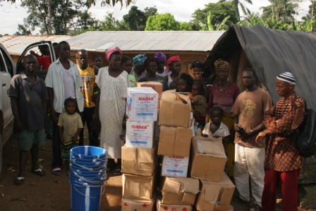 Gbebedu a town close to the Guinean border survivers receive donation after losing 19 to ebola