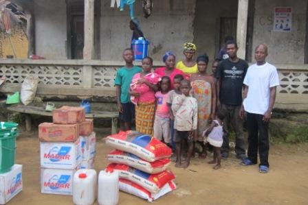 A family of 15 in Bo - a town at the border of Liberia and Sierra Leone receives aid from SEFL after losing 3 to ebola