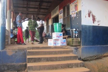 A  joint Security Check Point in Tiane, where general screening for ebola is conducted receive disinfectance from SEFL to help combat ebolaobserved by  County Health Team to avoid further spread