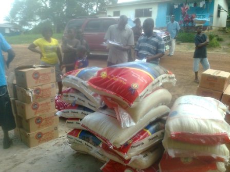 CH Rennie Hospital Administrator, Doctor Ramohn R. Cassel receive doantion after losing 20 Health Workers to ebola 