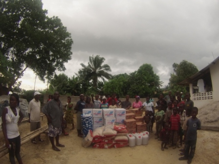 Victims in the World Bank Community receive donation after losing 13 to ebola