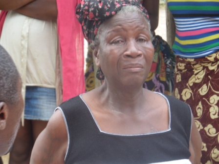 Madam Bendu Quey wept profusely upon receiving ration following the death of 53 years old son K Quey, who was bread winner and olny health worker in the area